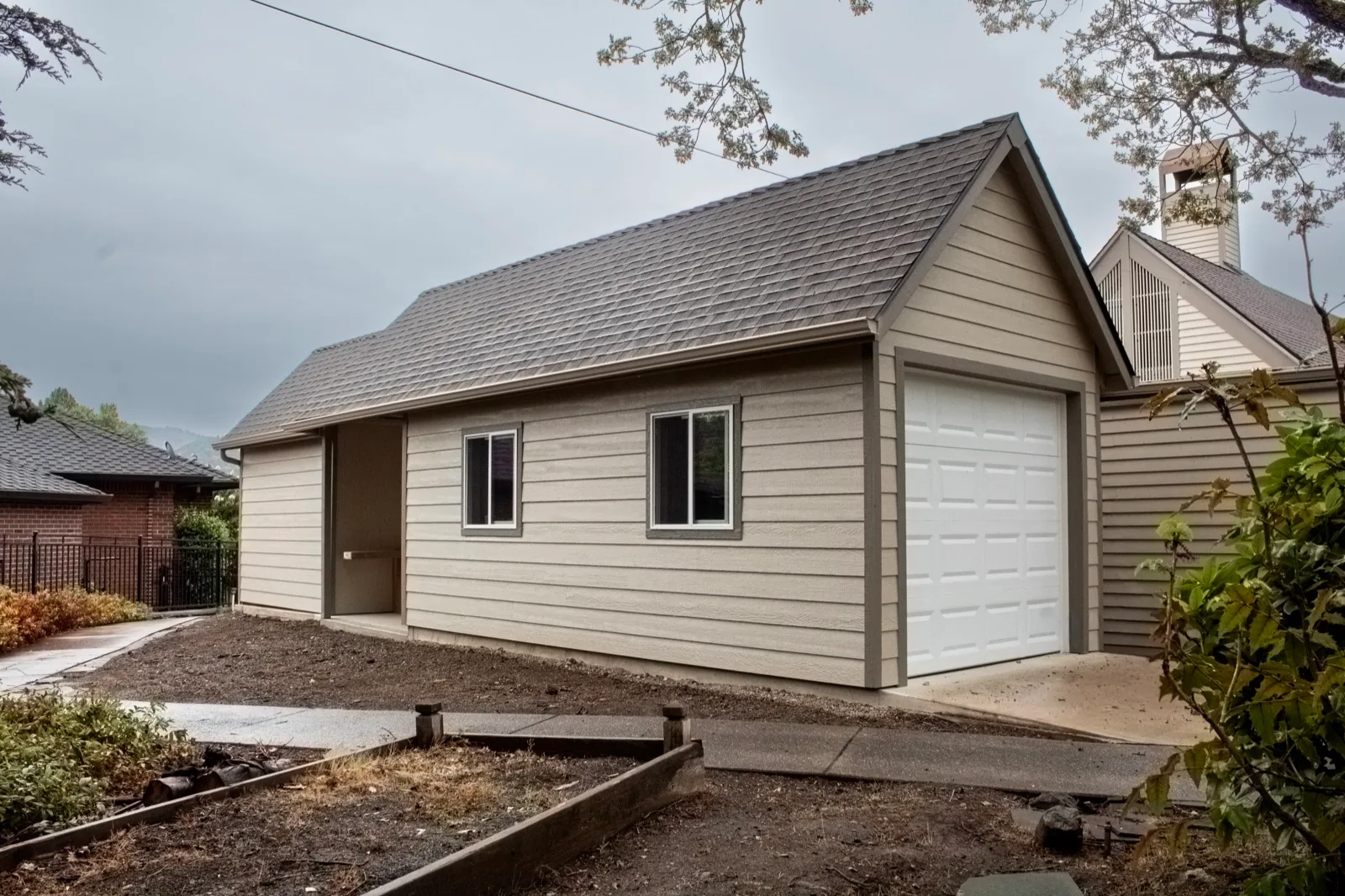 Finished detached garage built by The Shed Guys