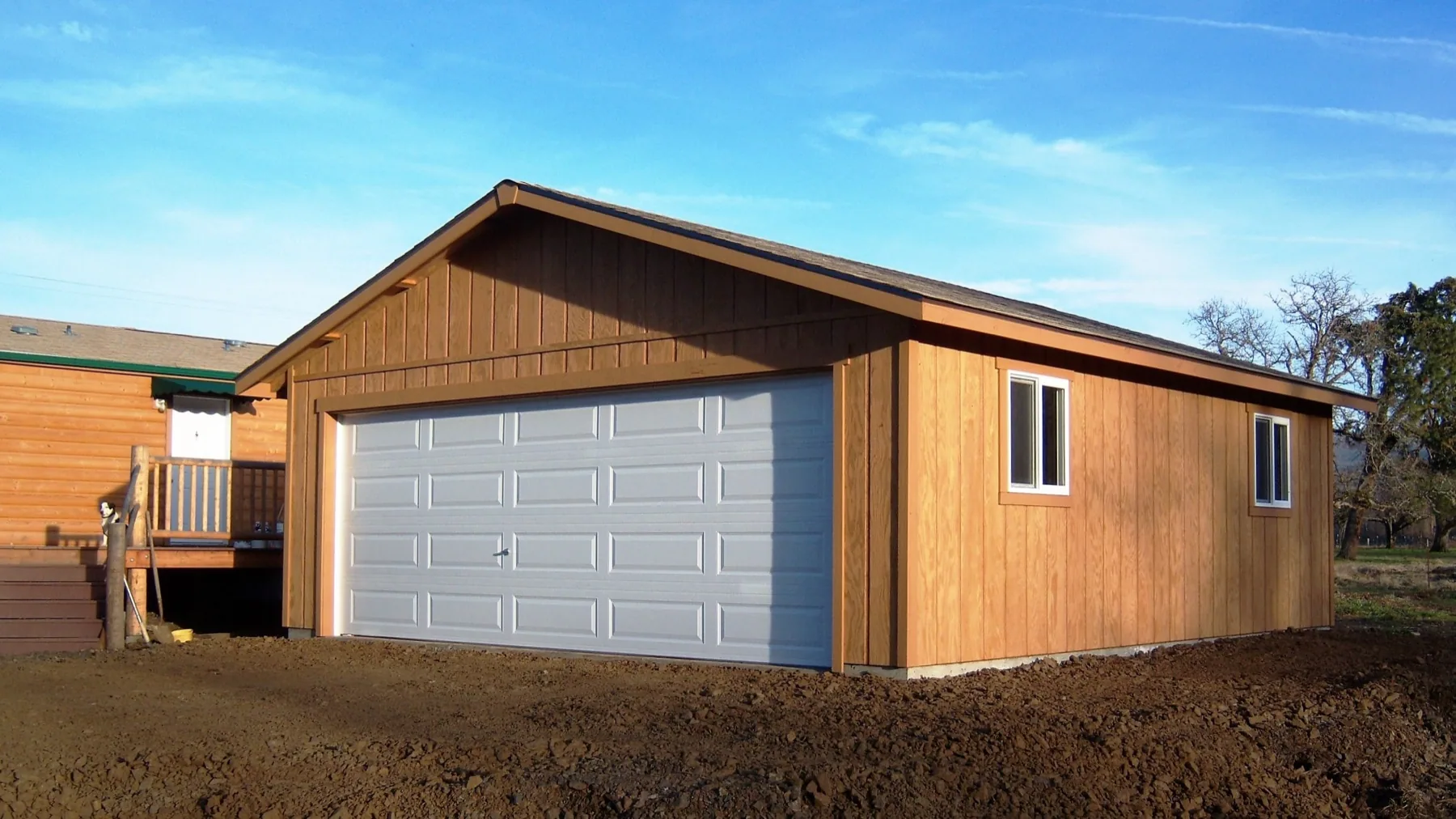 Graded Southern Oregon building site surrounding a completed structure