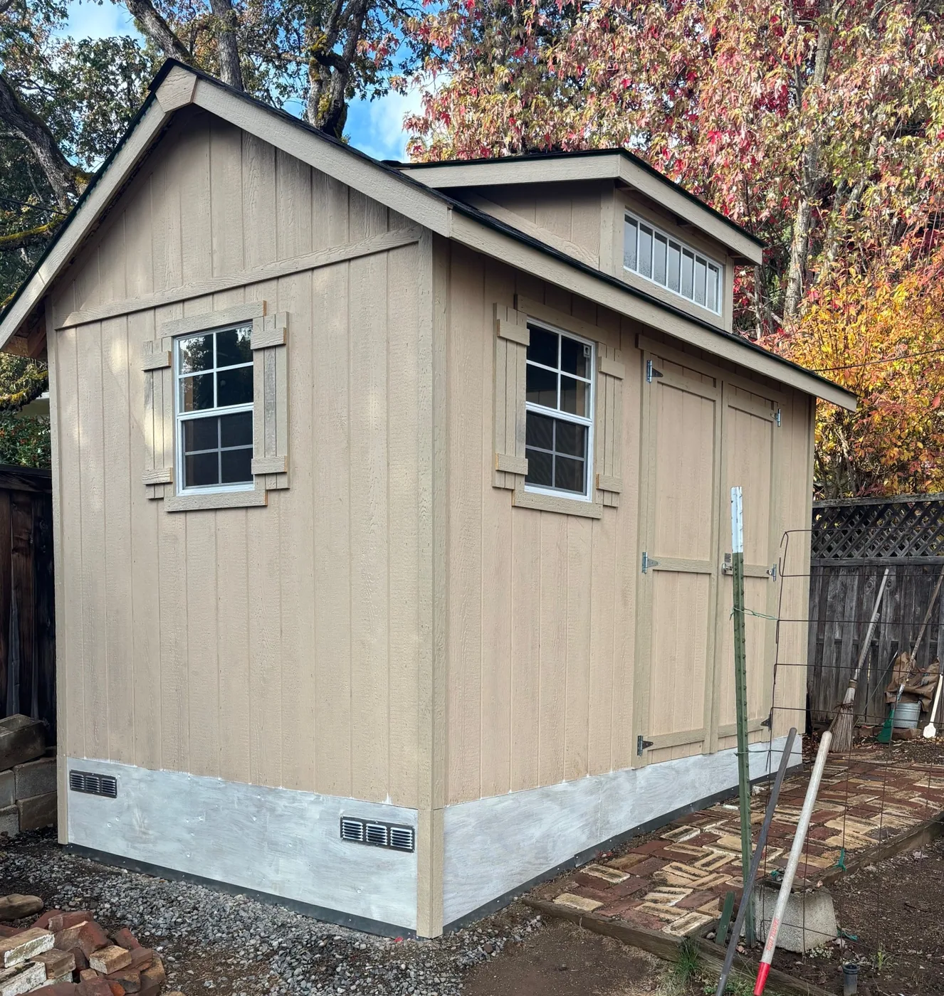 Finished custom shed with covered porch
